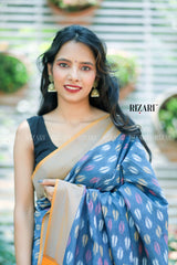 Blue Ikat Pochampalli saree with mustard border and Pallu