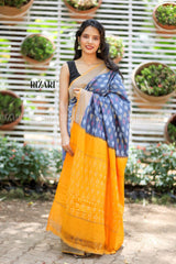Blue Ikat Pochampalli saree with mustard border and Pallu