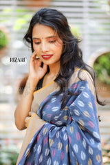 Blue Ikat Pochampalli saree with mustard border and Pallu