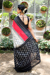 White Ikat Handloom Pochampalli Saree with Pink and Black border
