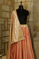 Peach Banarasi Katan silk Saree with golden Jari Butti all over and broad Jari boarder