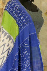 Off White with vibrant green and blue border and blue Pallu Ikat Pochampalli Saree