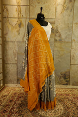 Grey Ikat handwoven Pochampalli saree with mustard border and Pallu