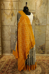 Grey Ikat handwoven Pochampalli saree with mustard border and Pallu