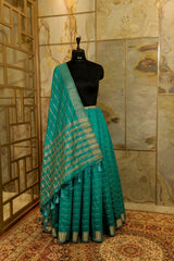 Teal Tussar Saree with Jari Butti all over body and Jari borders