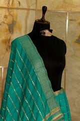 Teal Tussar Saree with Jari Butti all over body and Jari borders