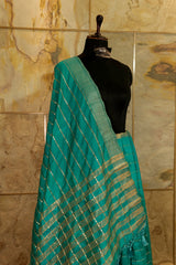 Teal Tussar Saree with Jari Butti all over body and Jari borders