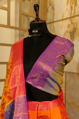 Orange dual-tones Pochampalli super soft saree with contrast purple-gold blouse