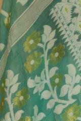 Pastel green cotton jamdani with white and gold floral design weaved all over saree
