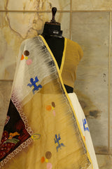 Hand painted Off White saree with Beige colored Pallu with batik lady figurine on Pallu and painted motifs all over body