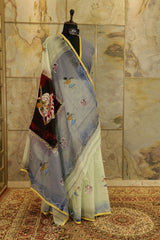 hand painted Pastel green cotton saree with grey pallu- with Batik lady figurine on Pallu