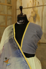 hand painted Pastel green cotton saree with grey pallu- with Batik lady figurine on Pallu