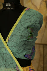 Hand painted Pastel peach shade saree with pastel green Pallu