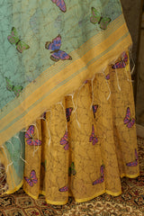 Hand painted Pastel peach shade saree with pastel green Pallu