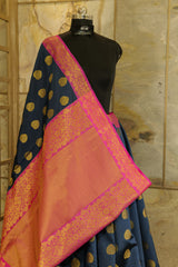 Dark blue banarasi with dark pink border and dark pink Pallu with rich golden work all over Pallu