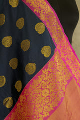 Dark blue banarasi with dark pink border and dark pink Pallu with rich golden work all over Pallu