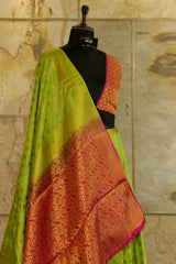 Green soft silk banarasi all over buttas with contrast pink brocade Pallu and pink brocade blouse