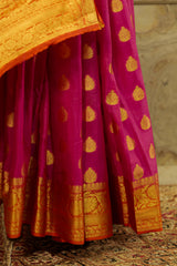 bright pink banarasi soft silk with orange Pallu and orange brocade blouse piece