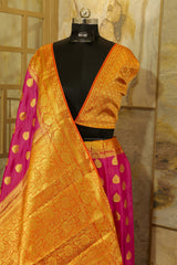 bright pink banarasi soft silk with orange Pallu and orange brocade blouse piece