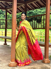 Olive green Kanjivaram Silk Saree with Pink Temple Border