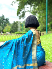 Blue Tussar Saree with golden Jari Butti all over body and Jari borders