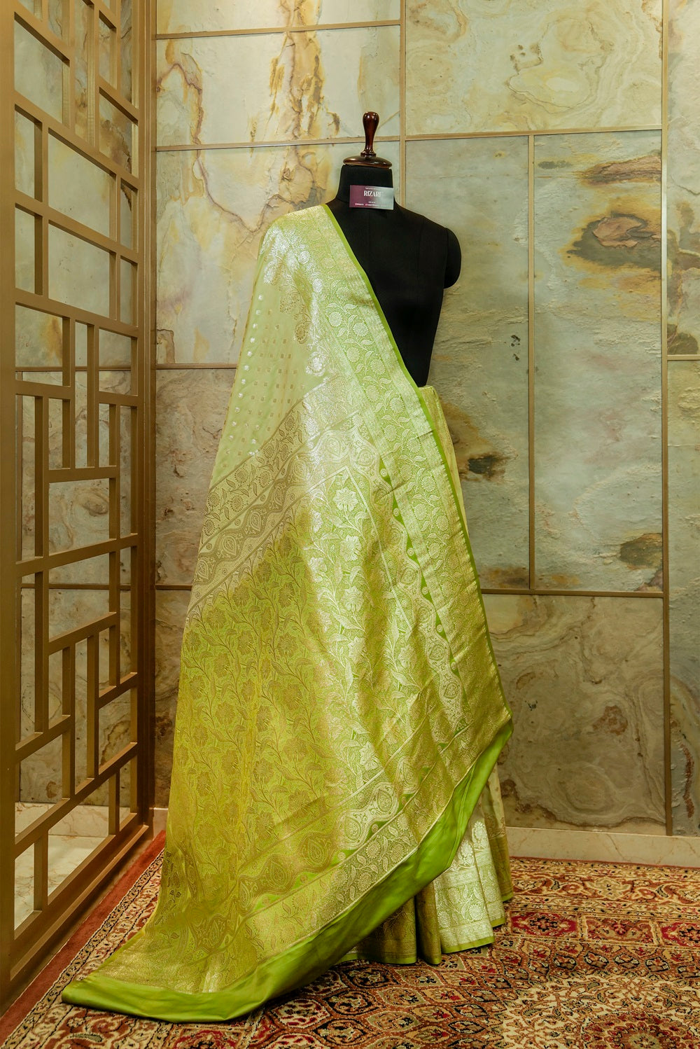 Olive green katan silk Banarasi saree with silver Jari