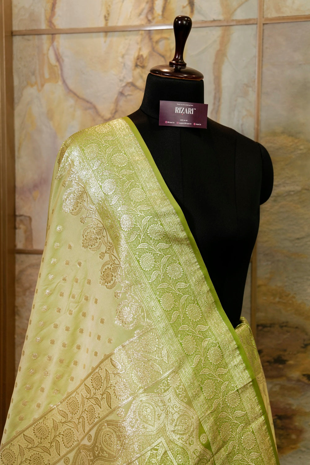 Olive green katan silk Banarasi saree with silver Jari