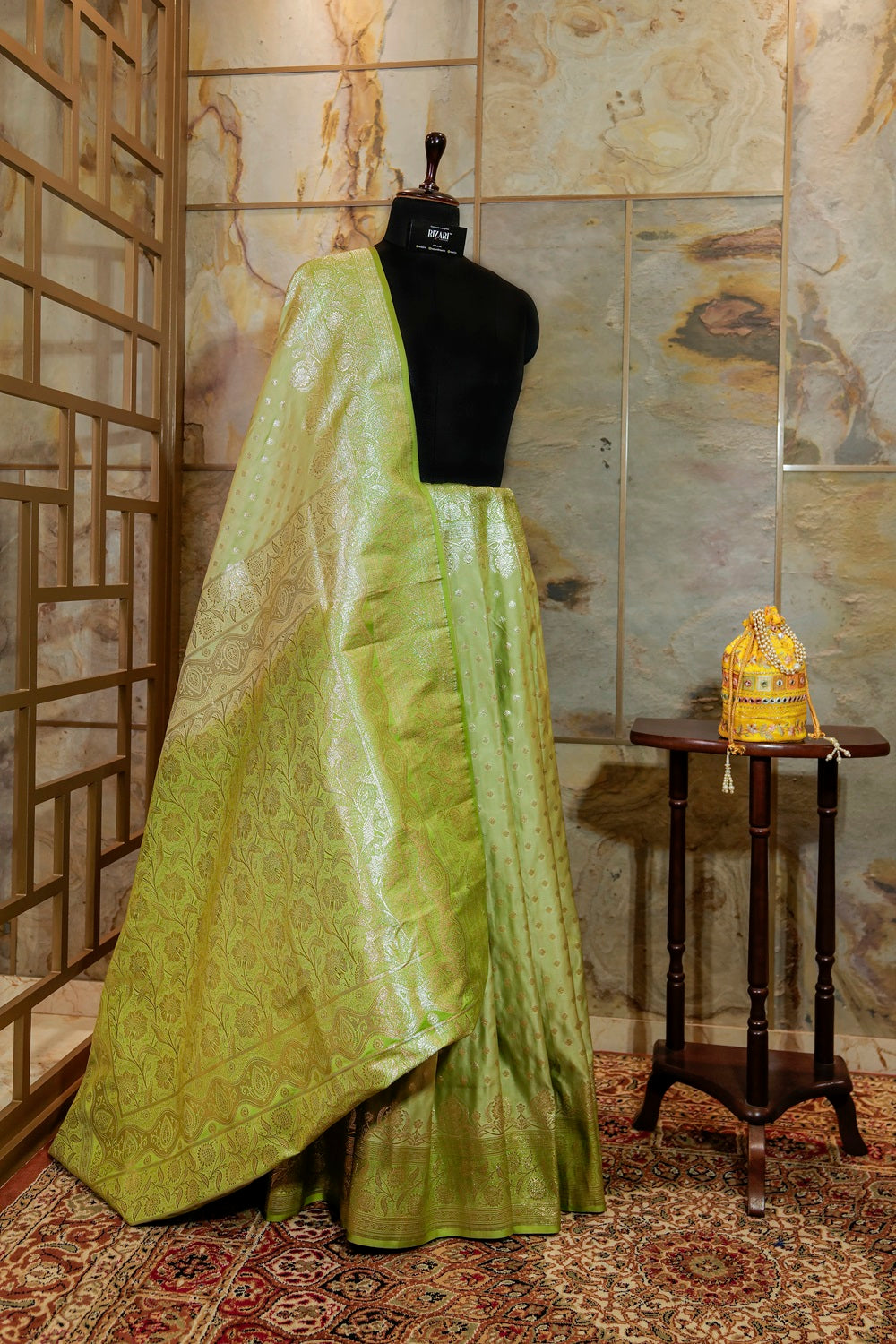 Olive green katan silk Banarasi saree with silver Jari