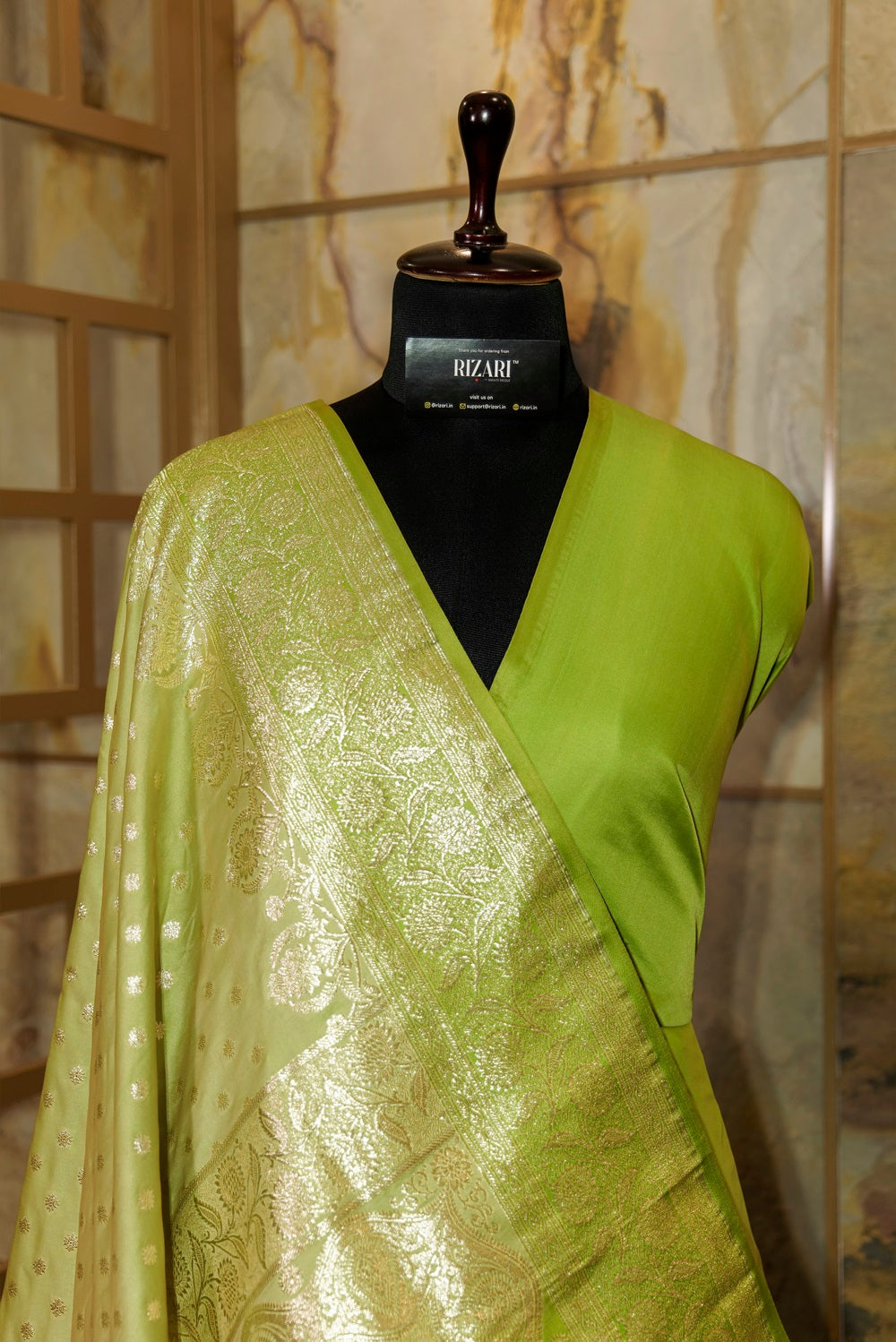 Olive green katan silk Banarasi saree with silver Jari