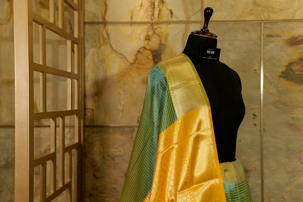 Pastel Blue Tissue Saree with contrast yellow Pallu and Blouse Piece