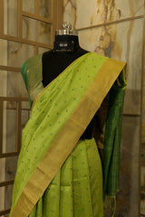 Green  Saree with  all over Buttis and Dark Green Contrast Pallu