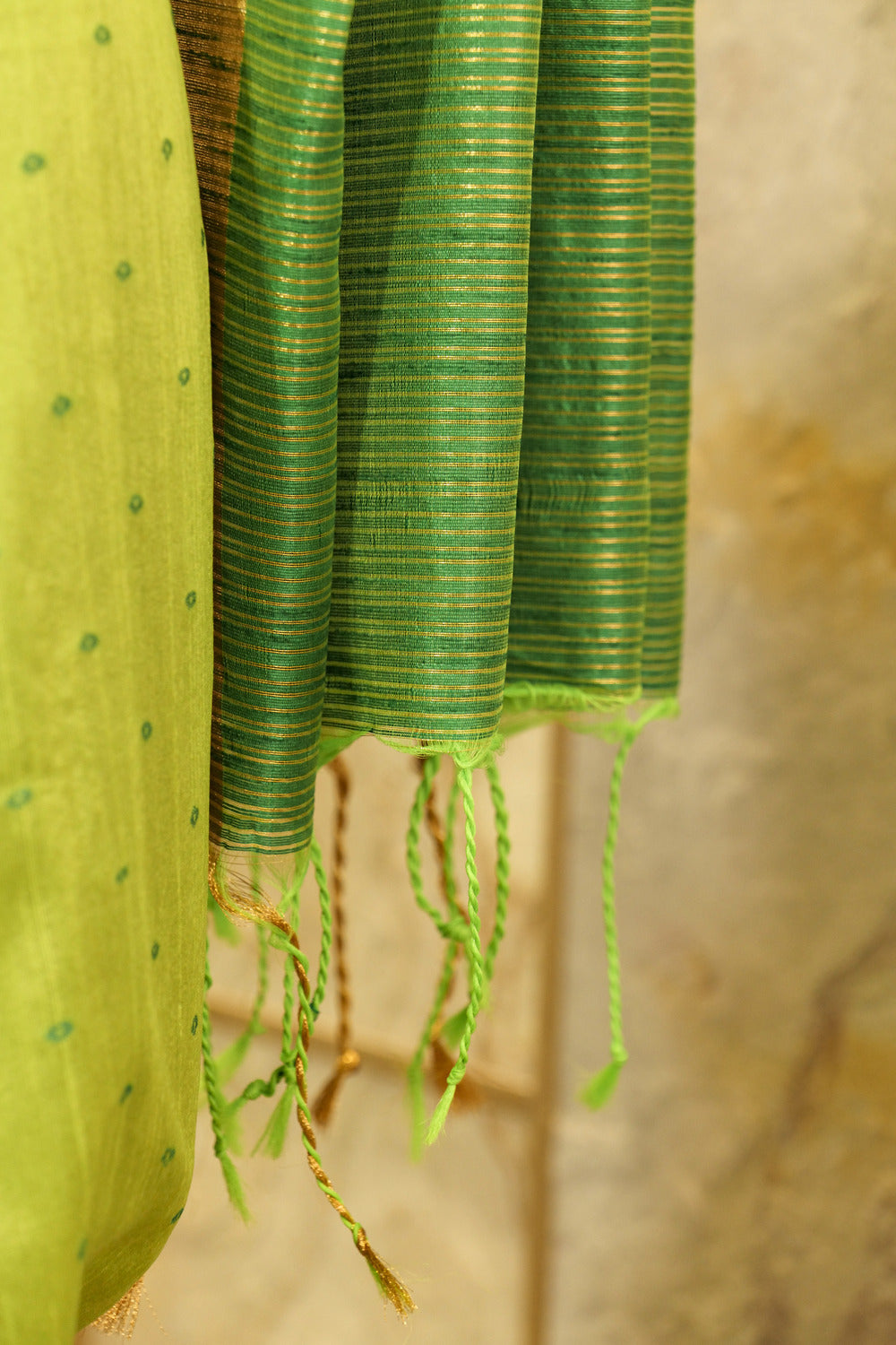 Green  Saree with  all over Buttis and Dark Green Contrast Pallu