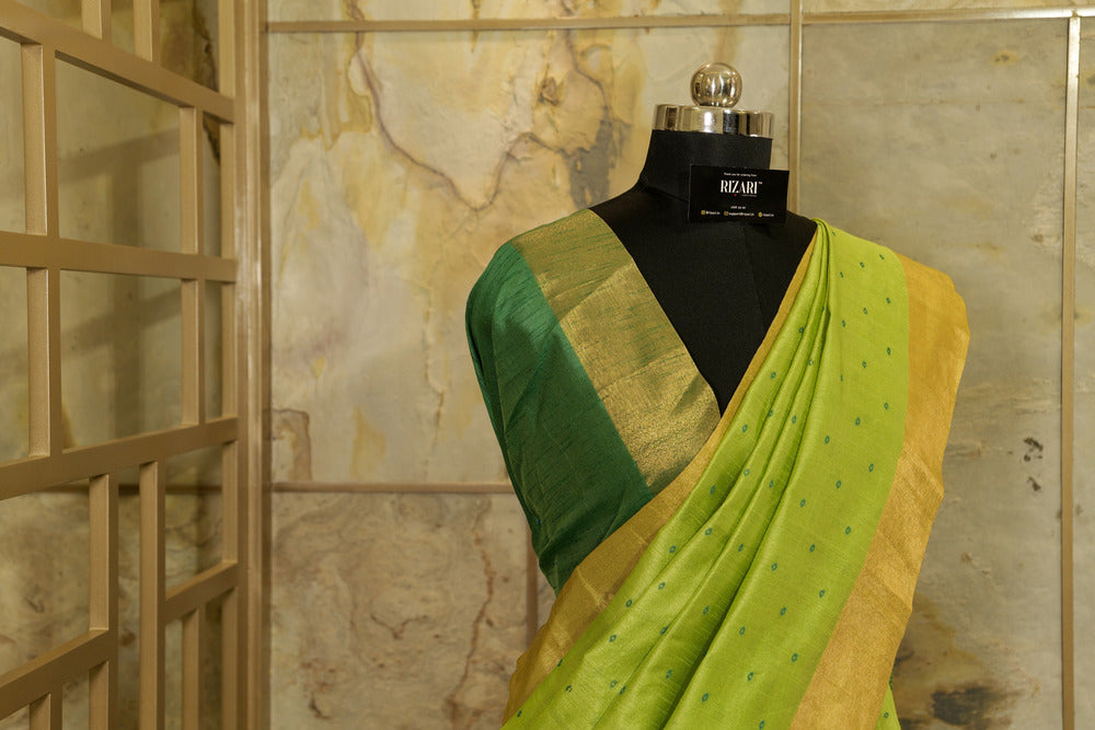 Green  Saree with  all over Buttis and Dark Green Contrast Pallu