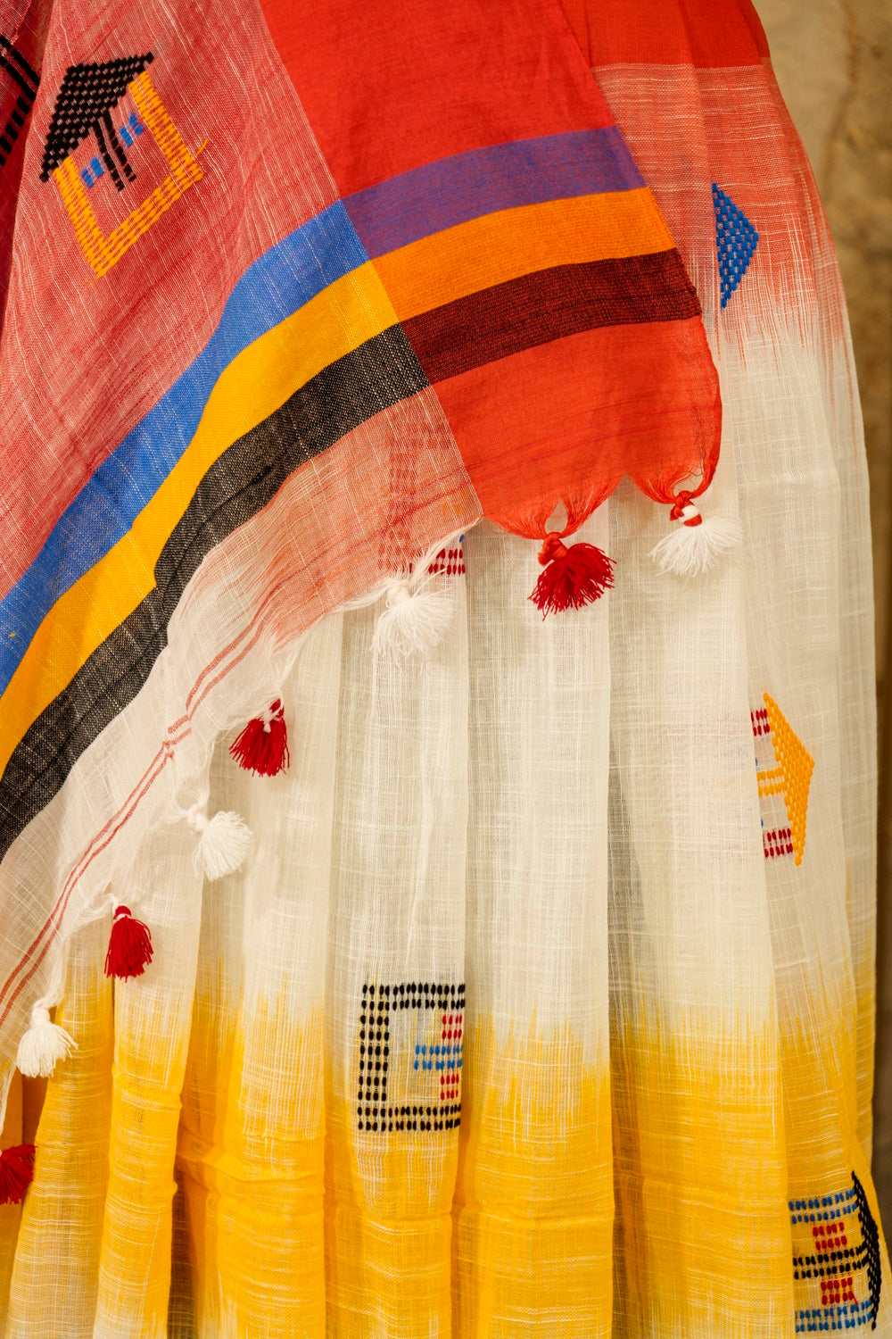 White and Red Linen saree with weaving pattern on Pallu