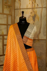 Orange Saree with Off White Ghicha Pallu and Brown border