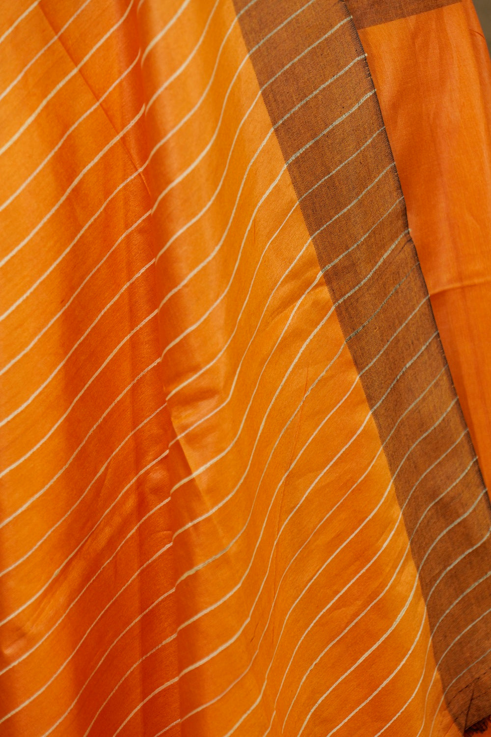 Orange Saree with Off White Ghicha Pallu and Brown border