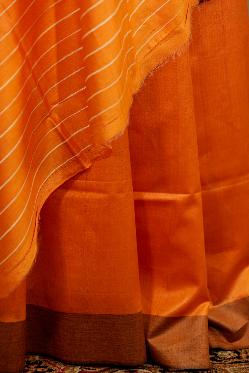 Orange Saree with Off White Ghicha Pallu and Brown border