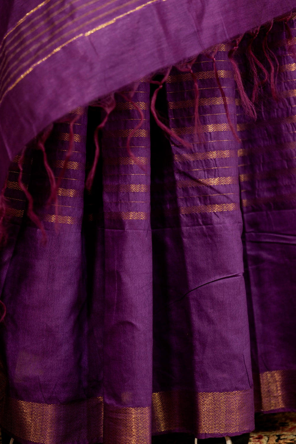 Purple Saree with Jari borders and horizontal Jari stripes and beautiful golden lining on Pallu with tasseled fringe