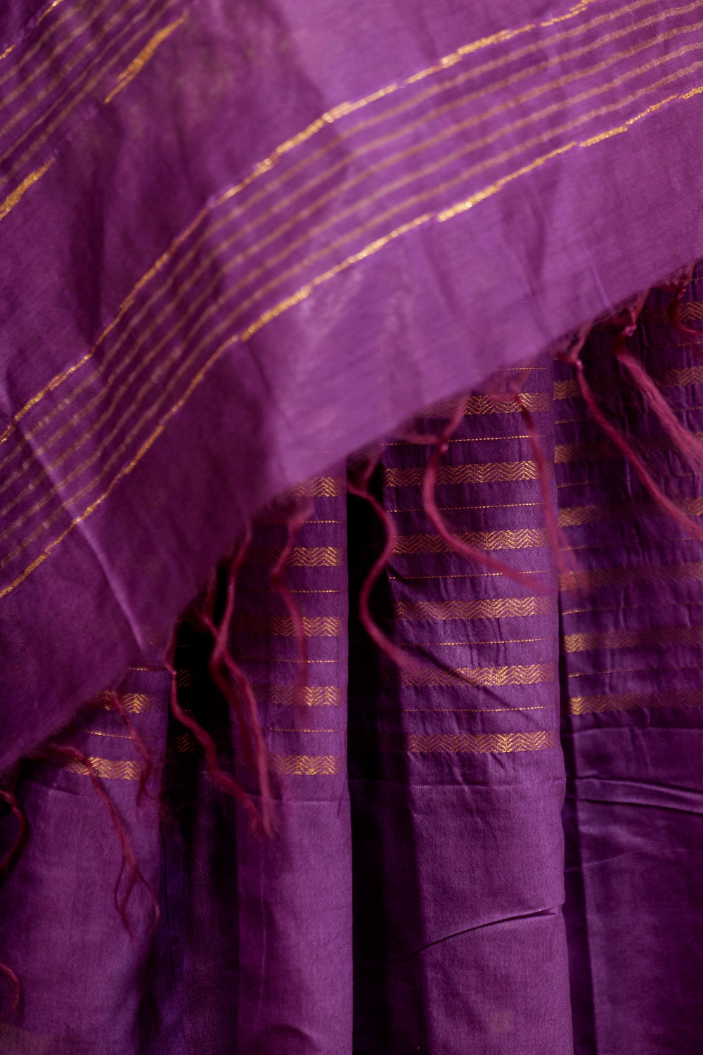 Purple Saree with Jari borders and horizontal Jari stripes and beautiful golden lining on Pallu with tasseled fringe