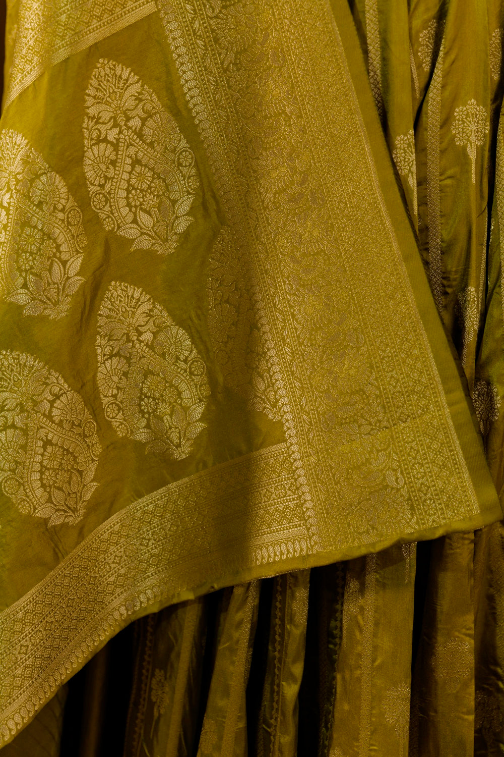 Olive green warm silk banarasi saree