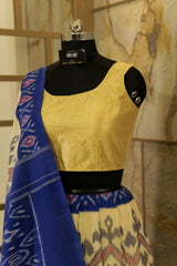 Off-White Ikat Pochampalli handwoven saree with blue border and Pallu