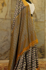 Grey Ikat Pochampalli saree with mustard border and dual tone Pallu