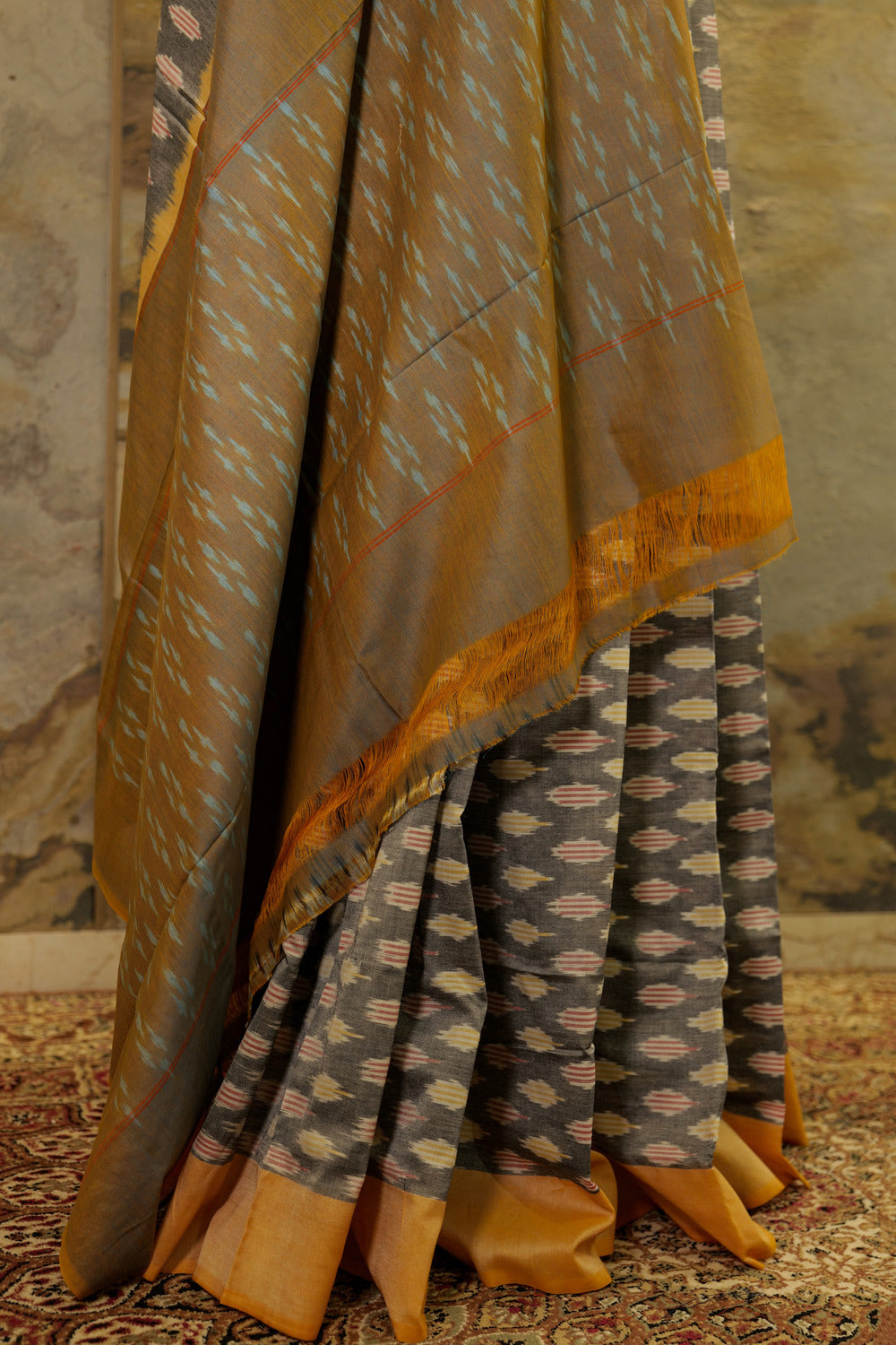 Grey Ikat Pochampalli saree with mustard border and dual tone Pallu