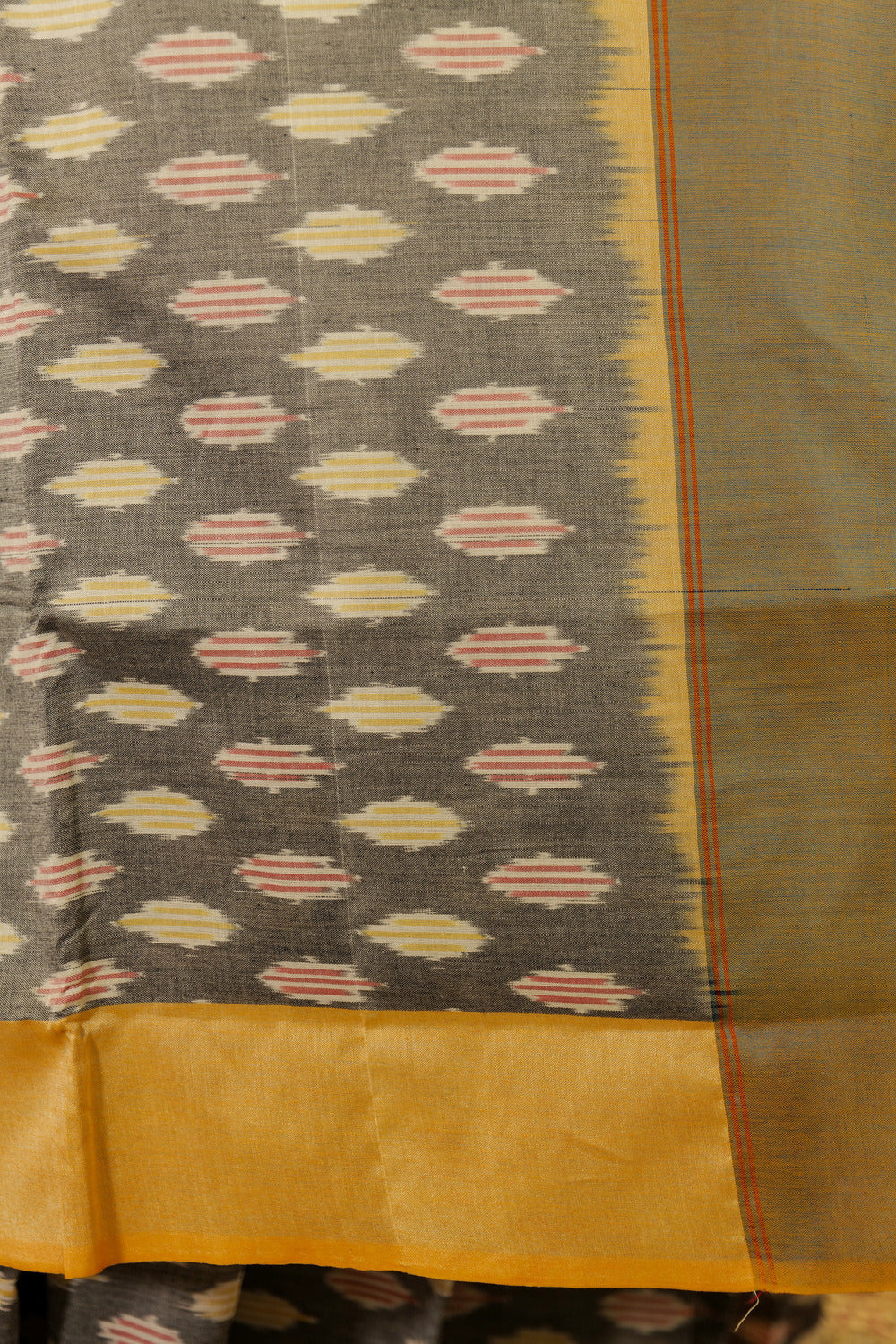 Grey Ikat Pochampalli saree with mustard border and dual tone Pallu