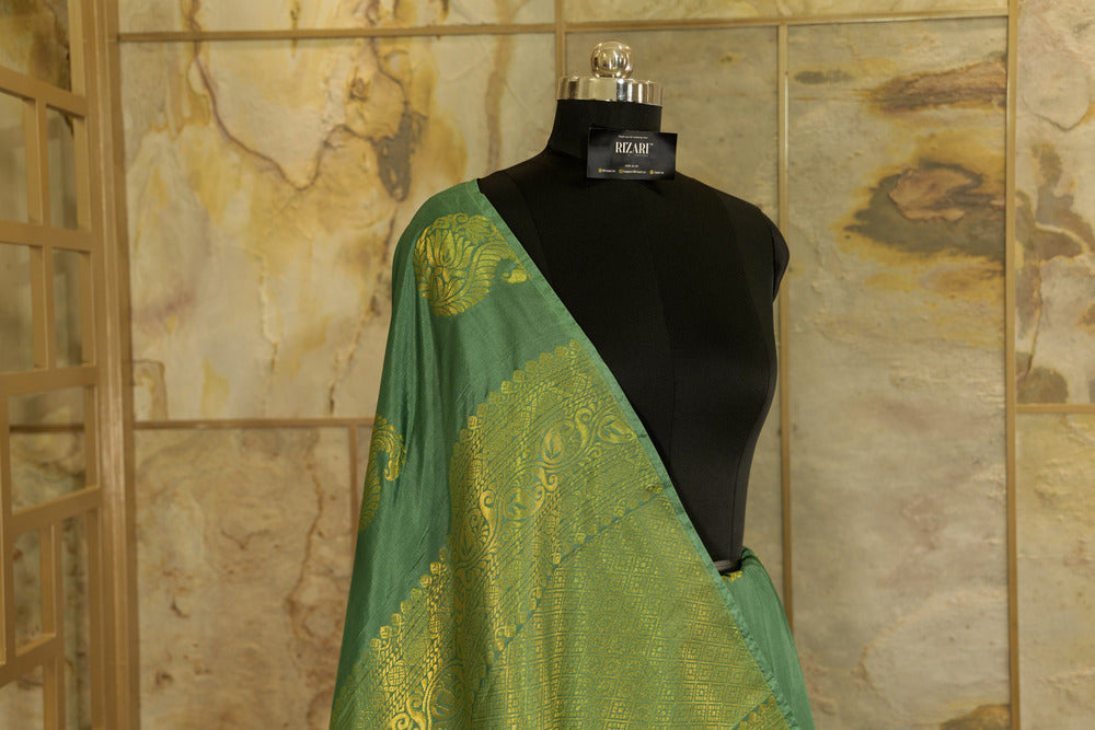 Green Soft silk saree with big buttas woven all over body