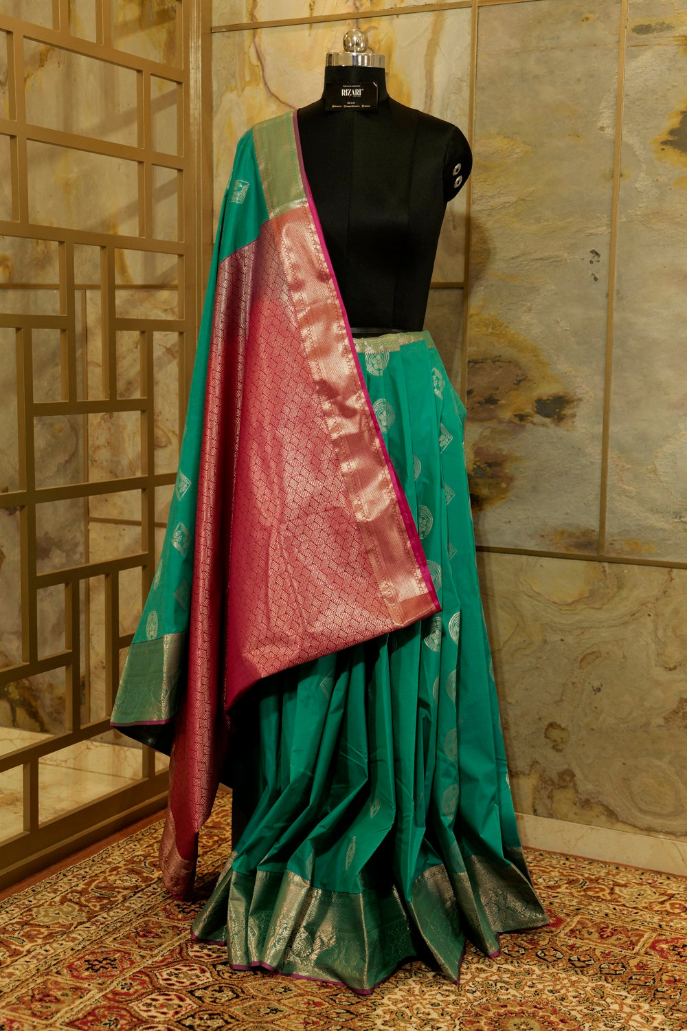 Peacock green & Pink Kanchi Silk saree with emboss buttas