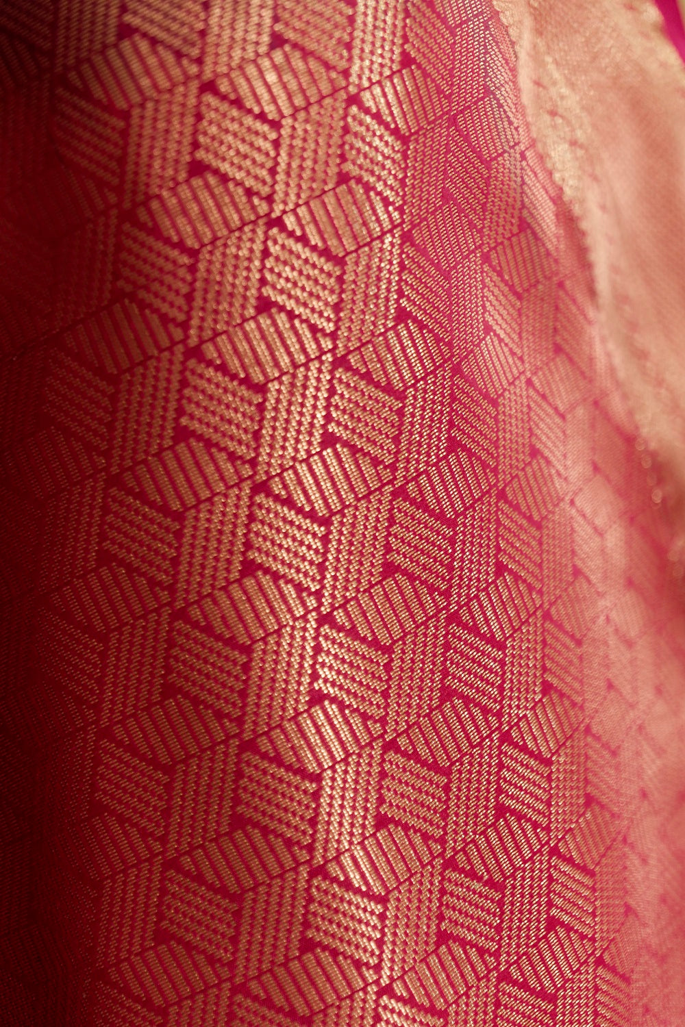 Peacock green & Pink Kanchi Silk saree with emboss buttas