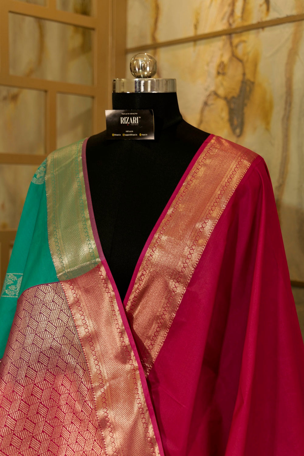 Peacock green & Pink Kanchi Silk saree with emboss buttas