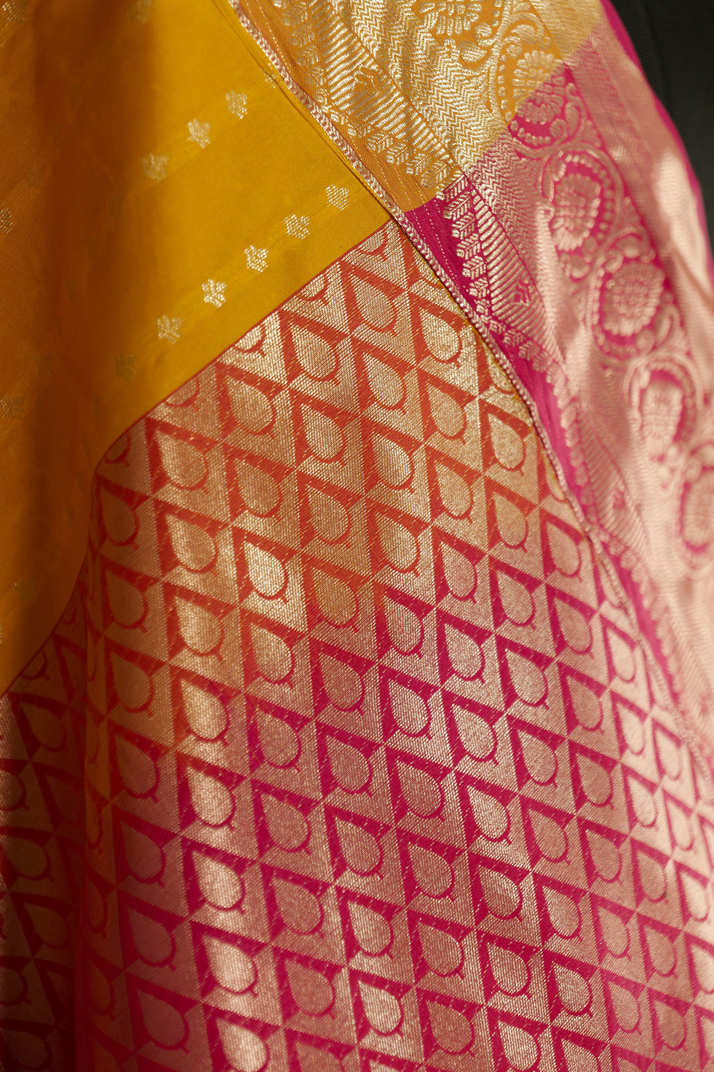 Mustard Kanchi silk saree with contrast pink Pallu and blouse rich jacquard borders on the sides