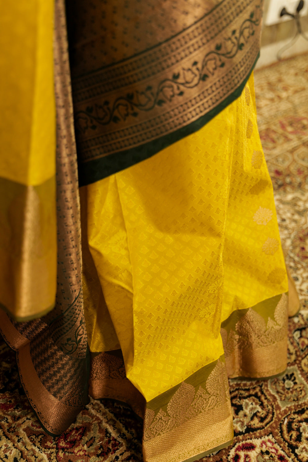 Mustard Kanchi silk saree with contrast bottle green Pallu - copper jacquard border